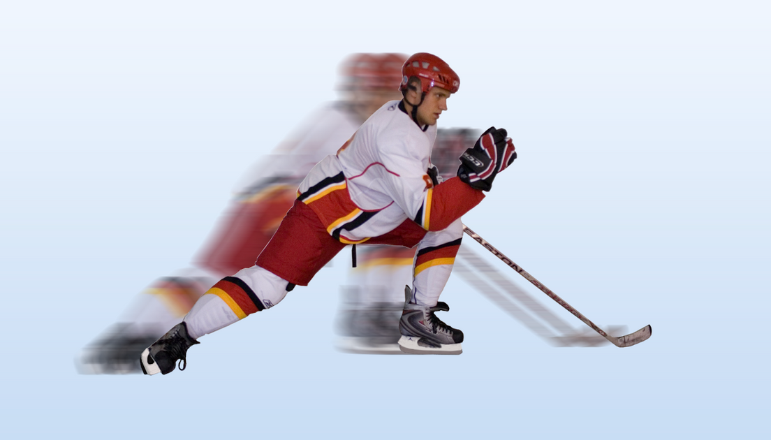Hockey player skating with speed and power